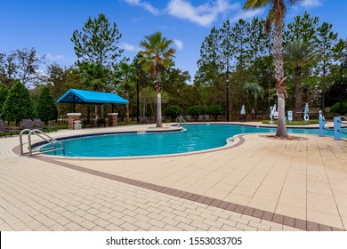 Middleburg, Florida / USA - November 5 2019: Community Pool With A Splash Pad And Slide