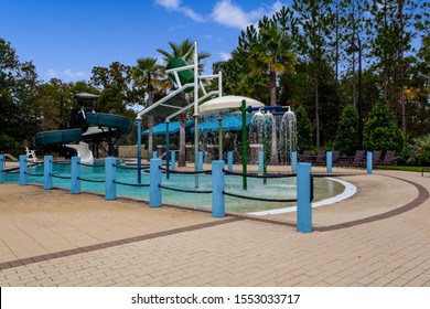 Middleburg, Florida / USA - November 5 2019: Community Pool With A Splash Pad And Slide