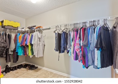 Middleburg, Florida / USA - November 7 2019: Mens Closet With Clothes And Shoes