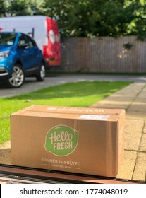 Middlesbrough/ UK. July 11, 2020. Hello Fresh Parcel Arrived At The Door In A Sunny Day The Delivery Van Is In The Background. There Is Grass In The Background. Hello Fresh Is A Food Delivery Service.