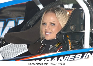 Middletown, NY, USA - April 2, 2022: Dirt Track Racer Jessica Friesen Prepares To Compete In A Stock Car Race  At Orange County Fair Speedway In Middletown, NY.