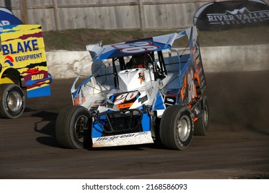 Middletown, NY, USA - April 2, 2022: Dirt Track Racer Derrick McGrew Jr. Pitches His Stock Car Into A Turn At Orange County Fair Speedway In Middletown, NY.