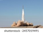 Mideast Iran Missile Test Fire.
Missile fires in the air with large smoke in the bottom.
