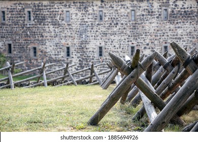 Mideaval wooden barricade or palisade in front of the fortress to pretect from enemy cavalries also known as cheval de frise - Shutterstock ID 1885694926