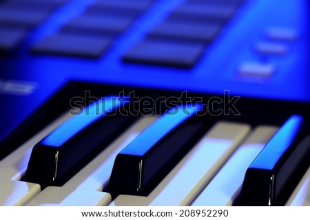 MIDI Controller Keyboard in Blue Light