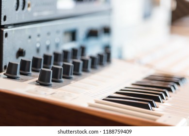 Midi Keyboard Synthesizer And Sound Module. Home Recording Studio Equipment, Shallow Dept Of Field. Music Background