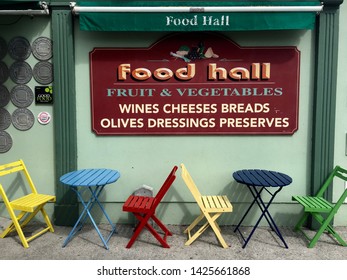 Midleton, County Cork / Ireland - June 24 2017 : Food Hall Signage With Colourful Chairs