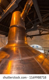 Midleton. Ireland. 06.11.16. Copper Pot Still Used In The Production Of Irish Whisky. A Still Is Used To Distill Fermented Grain Mash By Heating To Selectively Boil And Then Cool To Condense The Vapor