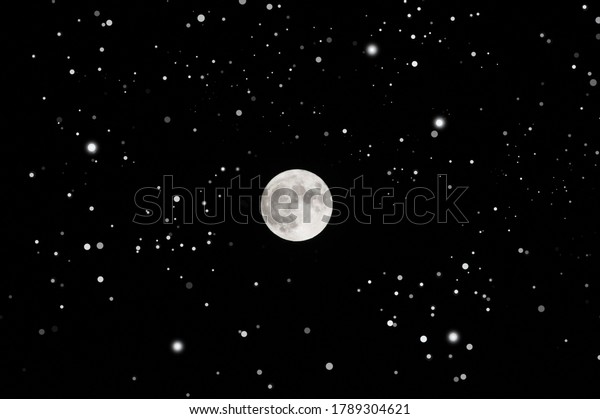 Midnight moon and stars\
closeup