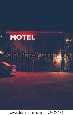 Midnight motel sign
