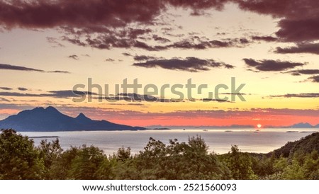 The midnight sun during which the sun never sets from Bodo, Norway