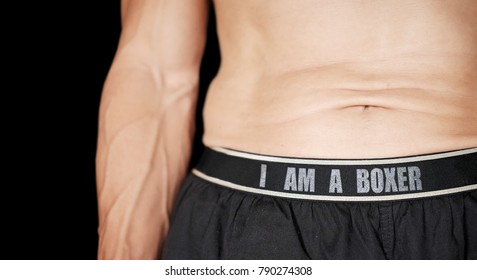 Midriff Of A Man Wearing A Boxer Shorts With The Message I Am A Boxer.