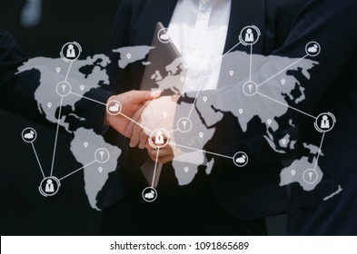 midsection business people team handshake after finishing up new project plan business meeting and icon world map network connection diagram, technology, internet, investment, global business concept