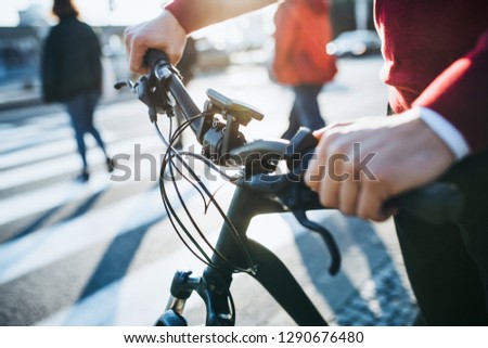 Similar – Foto Bild nicht erkennbare Person mit Elektroroller oder E-Scooter