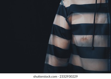 Midsection of man in transparent jacket