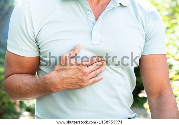 Midsection View Man Having Acid Reflux Stock Photo Edit Now 1158953971