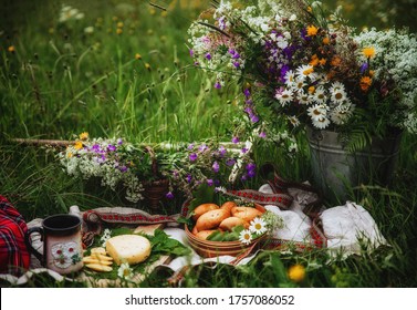 Midsummer in Latvia. Latvia summer. Traditional Latvian midsummer food. Celebration of Ligo in june decorating home with field flower bouquet. Symbolism of Latvia for Ligo holiday.