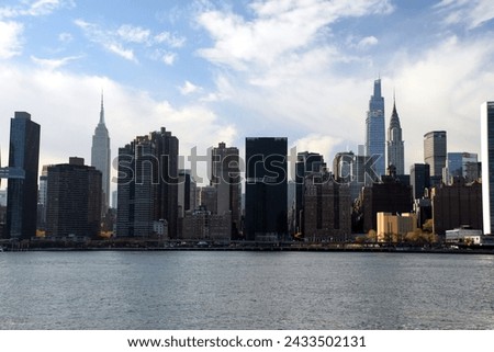 Midtown Manhattan, view from Queens across the East River.  Empire State Building, Chrysler building.