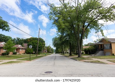 Midwest Neighborhood Street With Old Homes And Green Trees During The Summer In Lemont Illinois