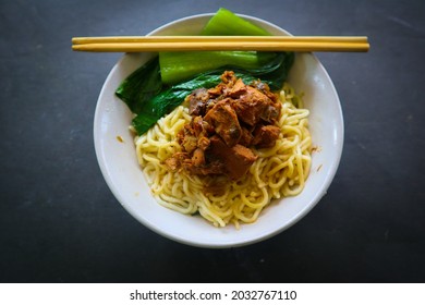 mie ayam or noodles chicken is traditional  food from indonesia, asia made from  noodle, chicken, chicken broth, spinach, sometimes with meatball.
