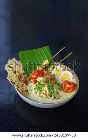 MIE KOCOK
CIREBON
Noodles, aromatic coconut chicken broth, chicken satay, boiled egg, rempeyek crackers and jamblang sambal