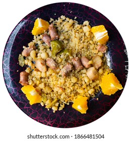 Migas Tropezones - Fried Semolina Crumbs With Green Pepper, Pieces Of Sausages And Bacon Garnished With Orange Slices. Popular Spanish Cuisine. Isolated Over White Background.