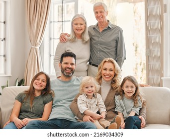 It Might Look Like Chaos But Its Just Our Family. Shot Of A Family Relaxing Together At Home.