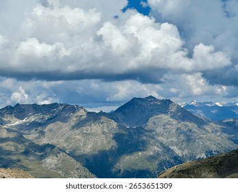 Mighty clouds above mountain range 
