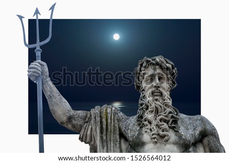 The mighty god of the sea and oceans Neptune (Poseidon) against sea at night. The ancient statue.