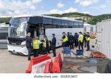 Migrants Are Loaded Onto A Bus In Dover, Kent, UK. 02.08.21