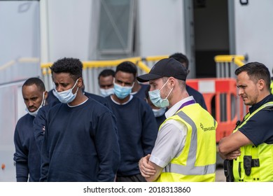 Migrants Are Loaded Onto A Bus In Dover, Kent, UK. 02.08.21