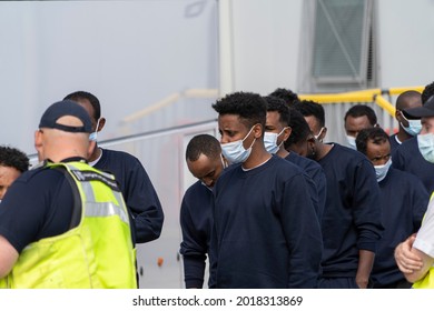 Migrants Are Loaded Onto A Bus In Dover, Kent, UK. 02.08.21