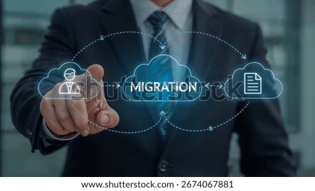 Migration Data Web Technology Concept. Business person using virtual touch screen push word: MIGRATION. Digital data transfer and exchange documents.