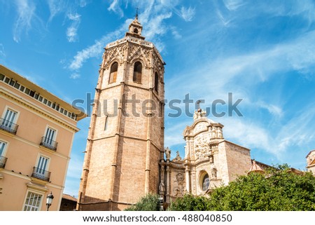 Miguelete tower and Cathedral in Valencia, Spain during the sunny day, cloudy sky