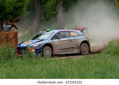 MIKOLAJKI, POLAND - JUL 1: Hayden Paddon And His Codriver Sebastian Marshall In Hyundai I20 Coupe WRC Race In The 74nd Rally Poland, On July 1, 2017 In Mikolajki, Poland.