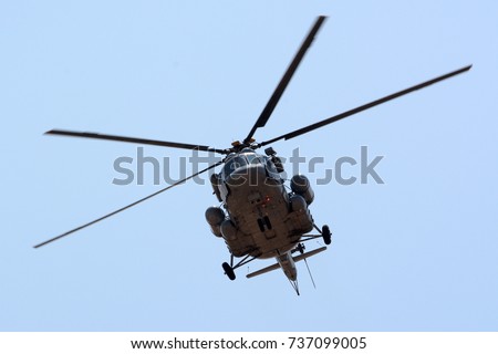 A Mil Mi-17 helicopter flying.