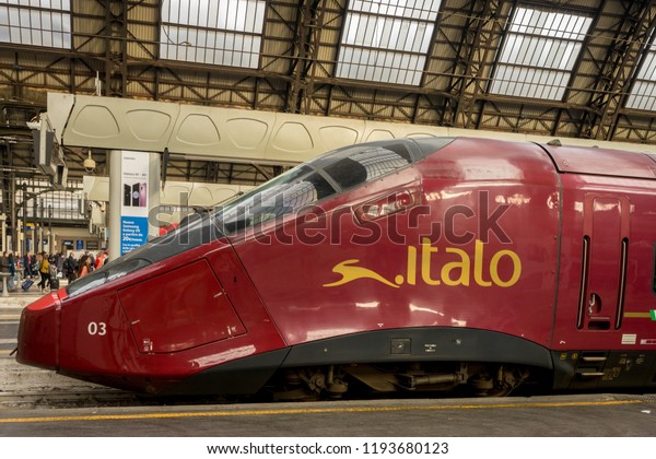 Milan Central Station - March 31: The italo\
Trenitalia at Milan central railway station on March 31, 2018 in\
Milan, Italy. The Milan railway station is the largest train\
station in Europe by\
Volume