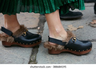 MILAN - FEBRUARY 24: Woman Poses For Photographers With Fur Gucci Clogs Before Gucci Fashion Show, Milan Fashion Week Day 1 Street Style On February 24, 2016 In Milan.