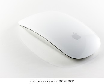 Milan, Italy - 08/27/2017: Close Up On Apple Magic Mouse Resting On A White Background.