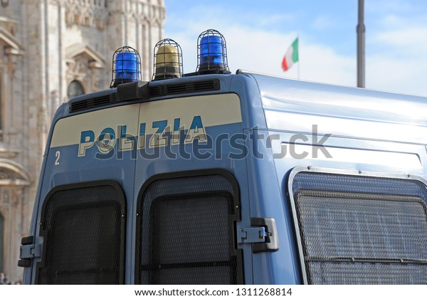 Milan ,\
Italy 12 february 2019 - Police checks in Duomo cathedral -\
policemen with car and truck control the flow of tourists, security\
operation and anti-terrorism law\
enforcement