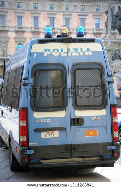 Milan ,\
Italy 12 february 2019 - Police checks in Duomo cathedral -\
policemen with car and truck control the flow of tourists, security\
operation and anti-terrorism law\
enforcement
