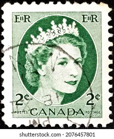 Milan, Italy, 17 November 2021: Postage Stamp Printed In The United Kingdom Showing Queen Elizabeth II - Wedding Portrait, Circa 1954.