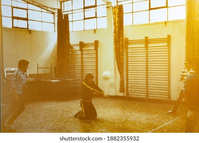 MILAN, ITALY 18 AUGUST 1975: Kids Play Volleyball In The School Gym