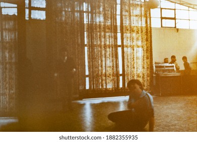 MILAN, ITALY 18 AUGUST 1975: Kids Play Volleyball In The School Gym