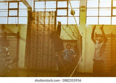 MILAN, ITALY 18 AUGUST 1975: Kids Play Volleyball In The School Gym