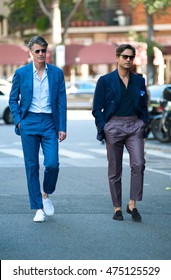 Milan, Italy - 20 June 2016 - Men Posing For Photographers And Gives Interviews Before ARMANI Fashion Show On Milan Men's Fashion Week Street Style