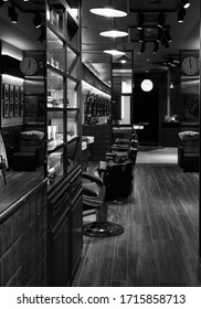 Milan, Italy - 22 August 2015: Barber Shop Closed And Illuminated At Night In The Night