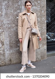 MILAN, Italy: 24 February 2019: Fashion blogger street style outfit after Dolce & Gabbana fashion show during Milan fashion week Fall/winter 2019/2020
