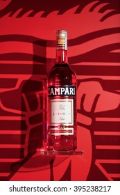 MILAN, ITALY - 4 SEPTEMBER 2013: A Bottle Of Campari Stands On Display  Inside A Gallery.