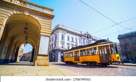 Milan, Italy - April 17, 2020: Piazza Della Scala. Desert Area During The Quarantine, From The Crown Of The Virus Covid19 In Milano. Spring In The City. Teatro Alla Scala. Leonardo Da Vinci. Old Tram